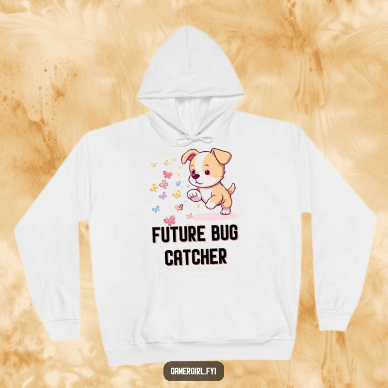 Funny hoodie featuring a playful puppy attempting to herd tiny, glowing pixelated butterflies. Cozy and whimsical gamer wear.